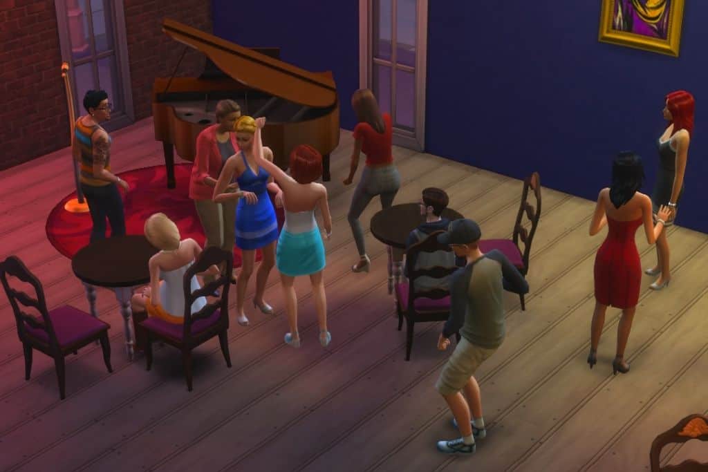 Skjermbilde av sims som danser i nattklubb Sims 4