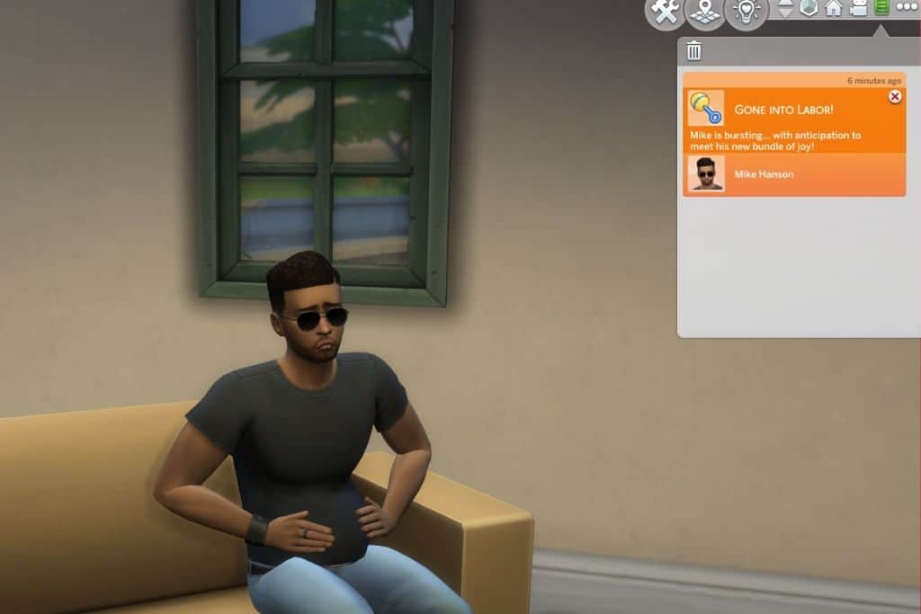 Skærmbillede af en mand, der er gravid ved hjælp af Sims 4 Mod