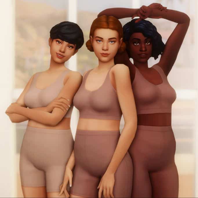 three sim women doing group pose