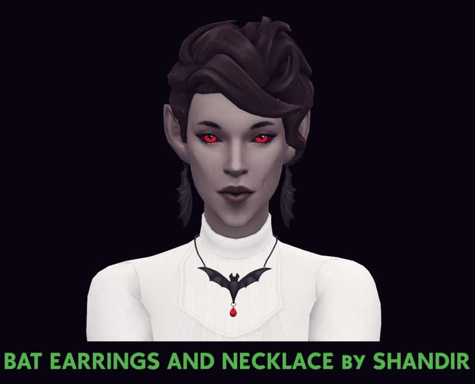 vampiric woman wearing bat necklace