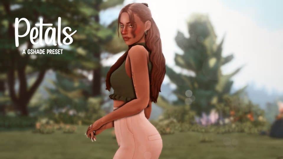 sims woman side with green top posing outdoors