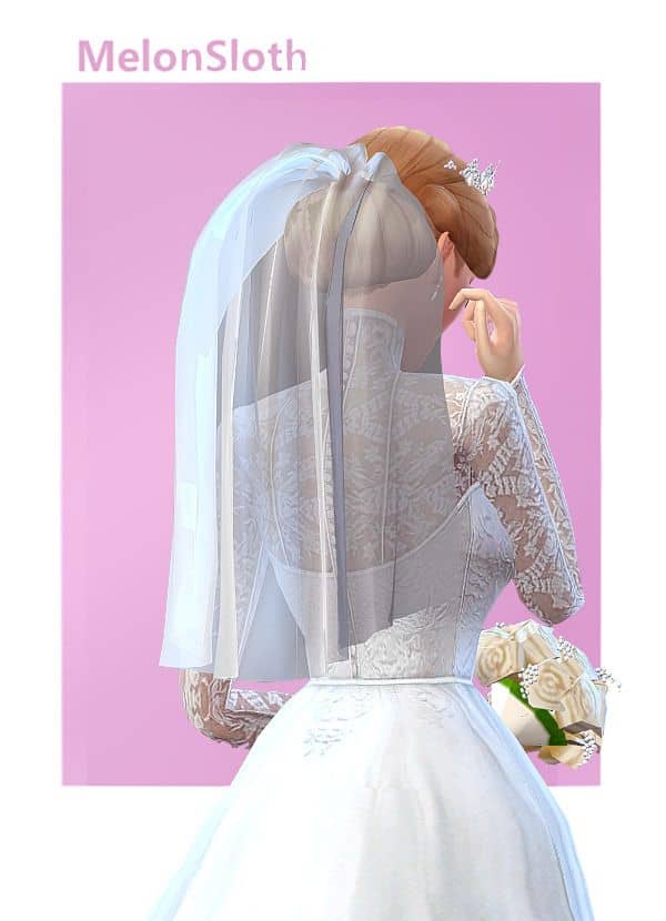 bride wearing medium length wedding veil