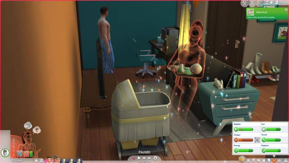 sims ghost holding an infant