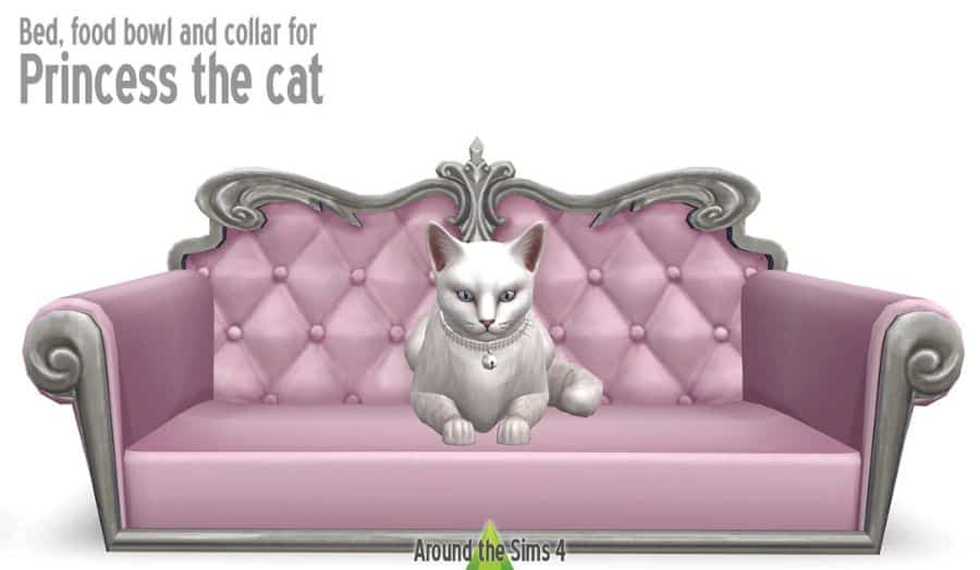 white cat on pink couch