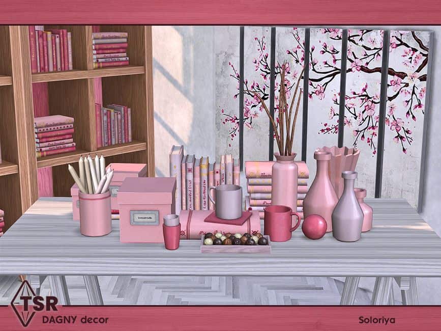 pink colored books and table accessories