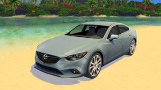 light gray mazda car on beach