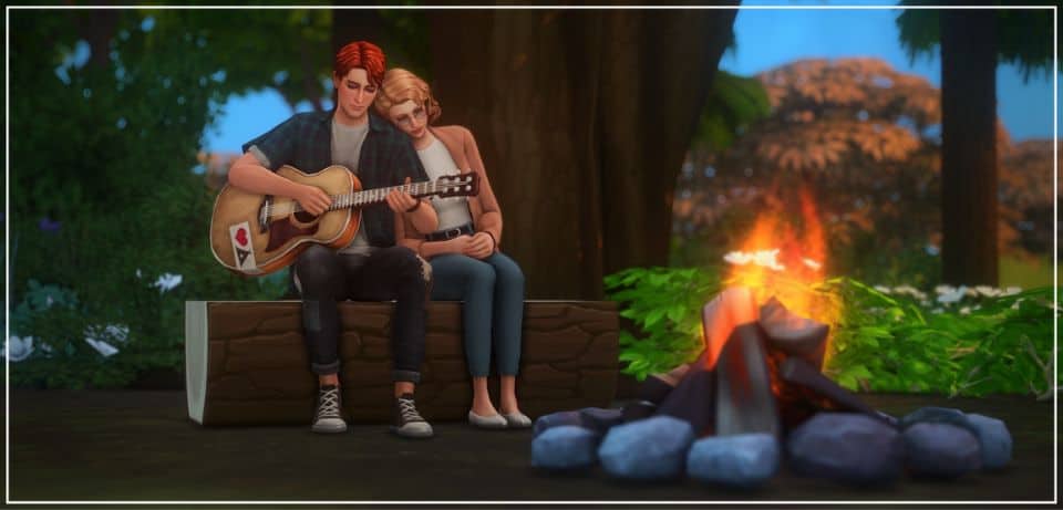 sim playing guitar by a fire