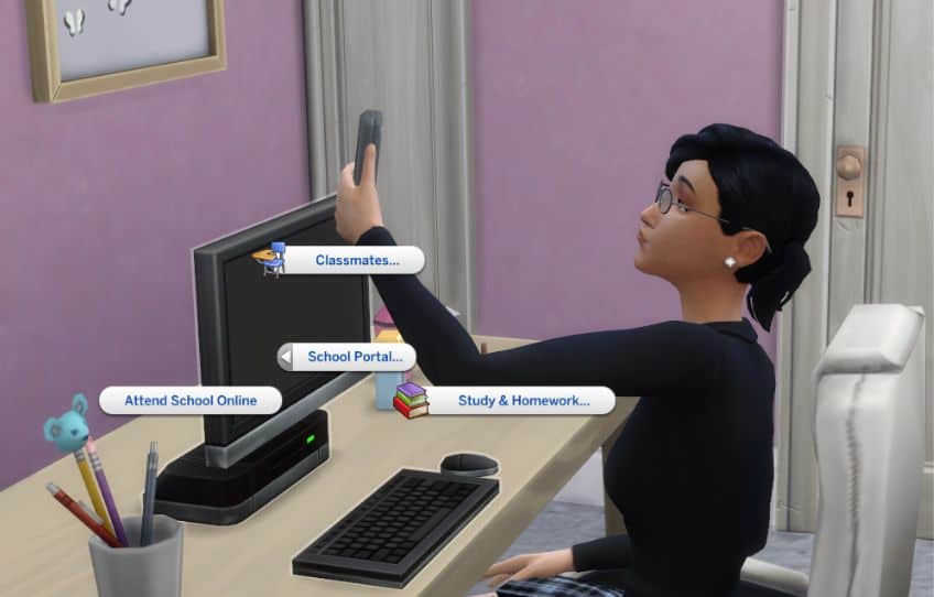 sim girl taking selfie at desk