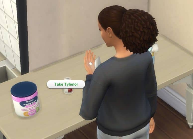 female sim near a container of child formula