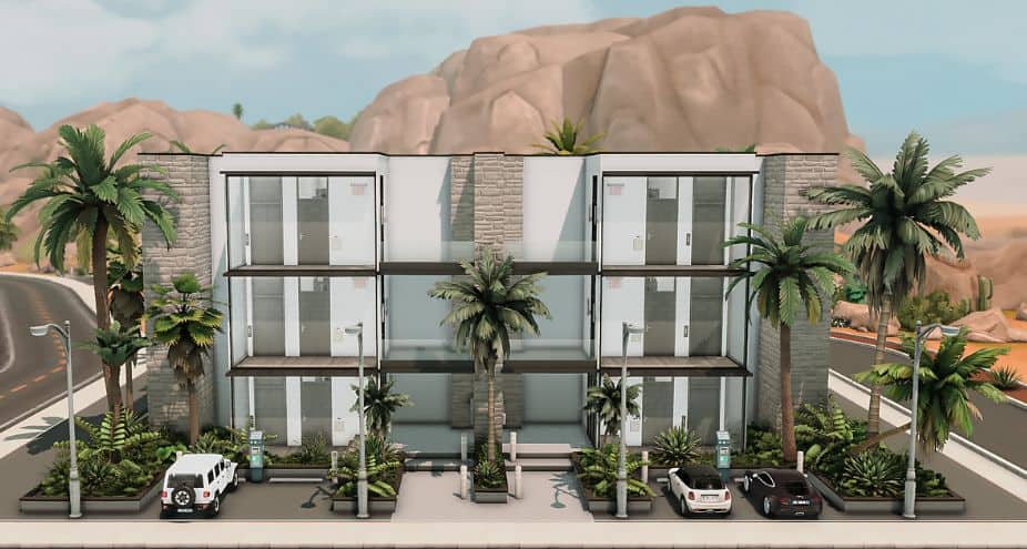 stone and glass apartments with exterior palm trees