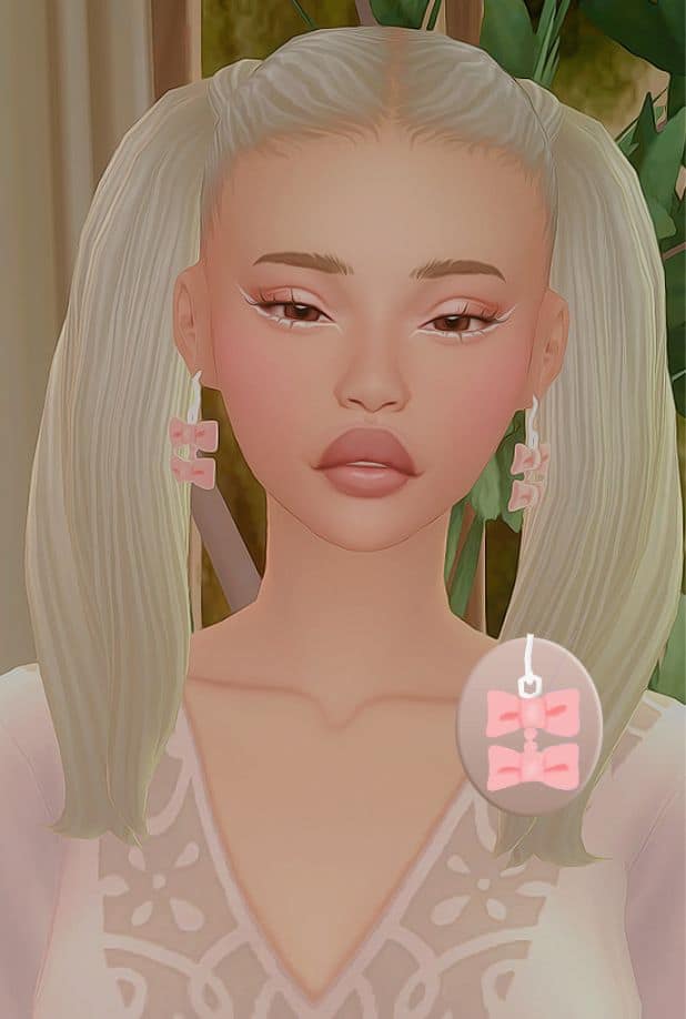 sim wearing bow shaped earrings