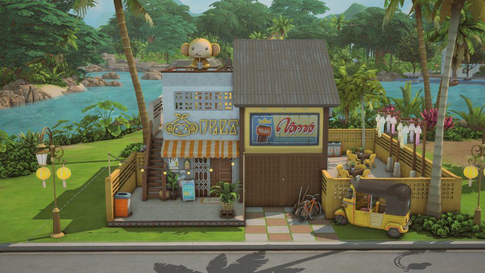 small building with thrift and bubble tea stores