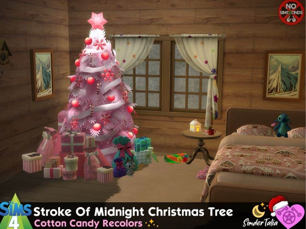 colorful pink Christmas tree with gifts beneath