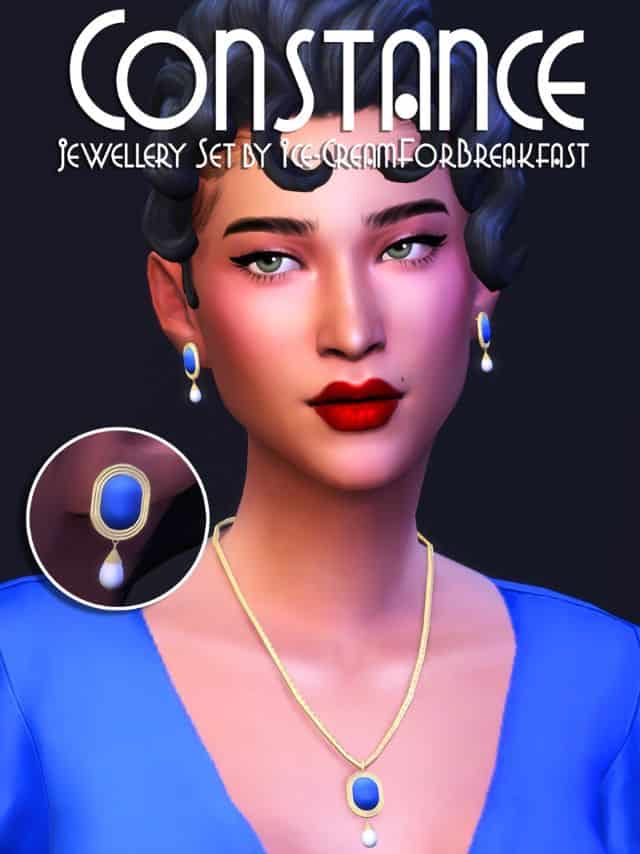 female sim wearing earrings and a necklace with bright blue stones