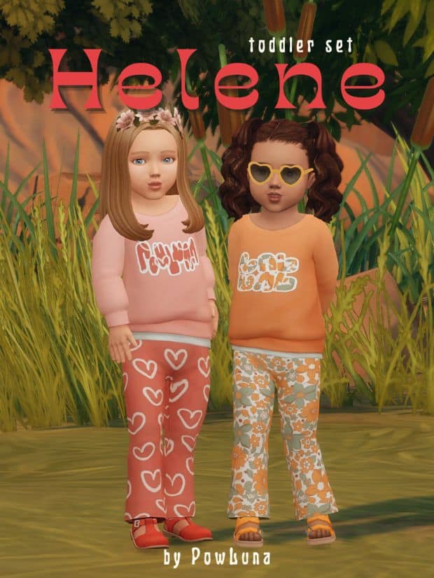 two female toddlers dressed in cute sweaters and patterned pants