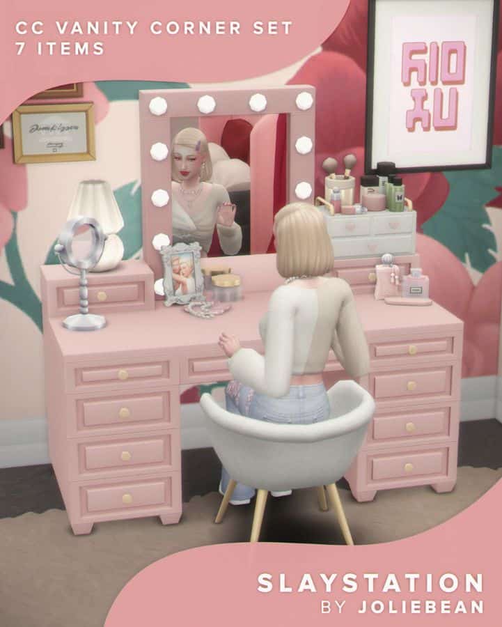 female sim sitting at a pink vanity set