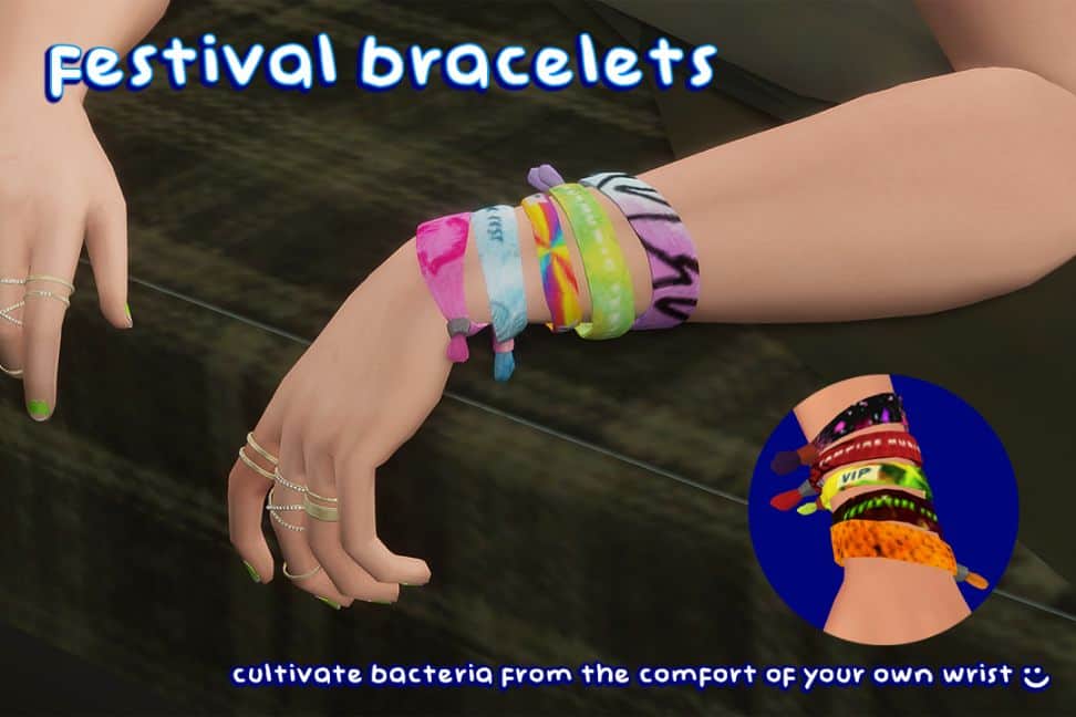 close up of an arm wearing festival bracelets