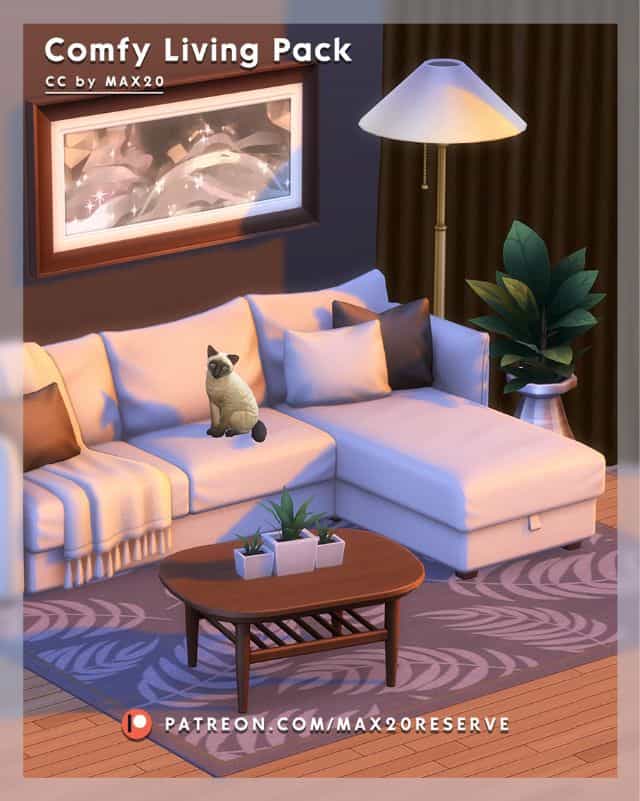 a cat sitting on a white couch