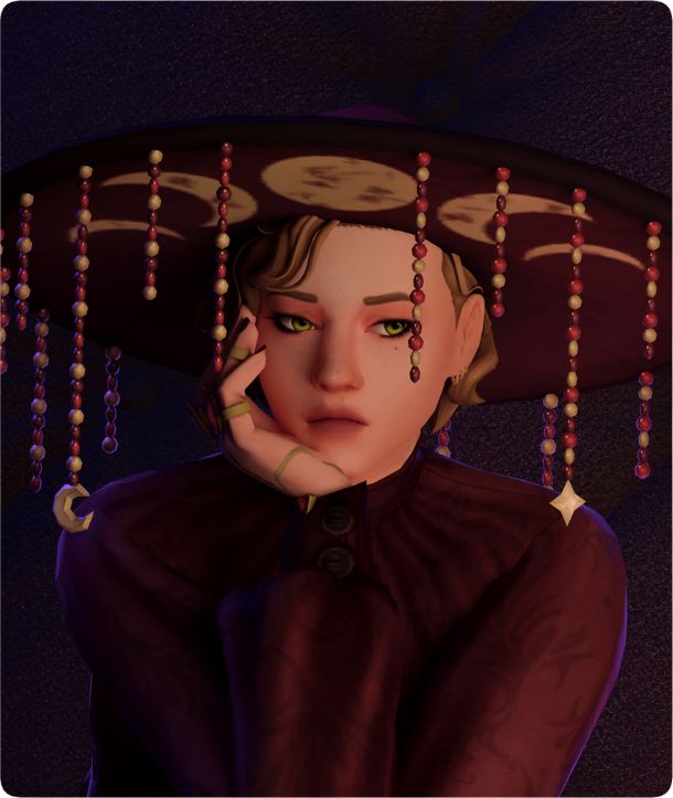 sim wearing a witch's hat with beaded tassels