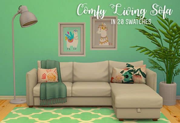 a comfy sofa with cushions and a throw blanket
