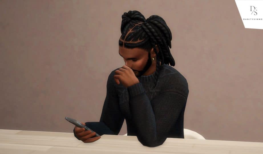 male Sim on his cellphone