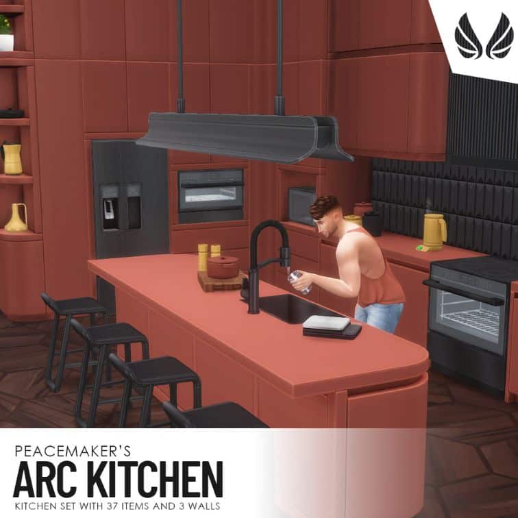 sim standing in a reddish monotone kitchen