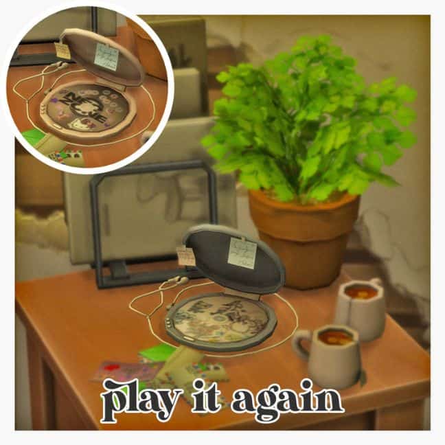 an open CD player on a wooden table