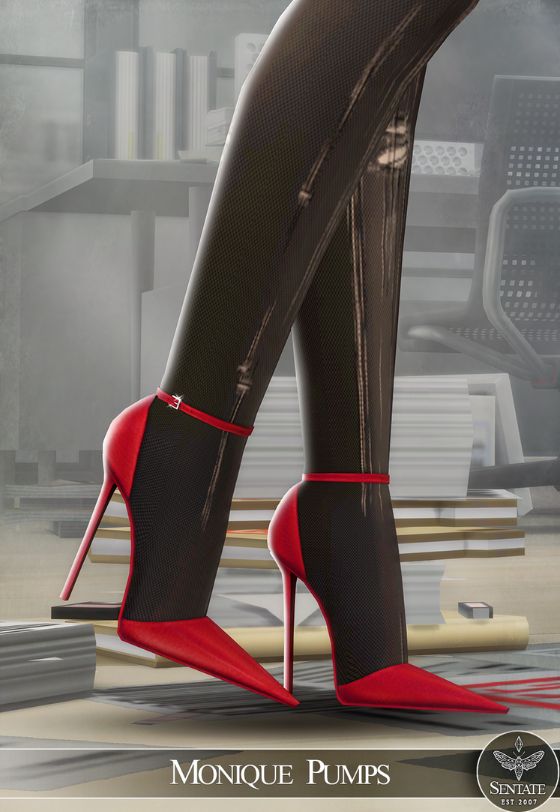 close up of red stiletto-heel pumps