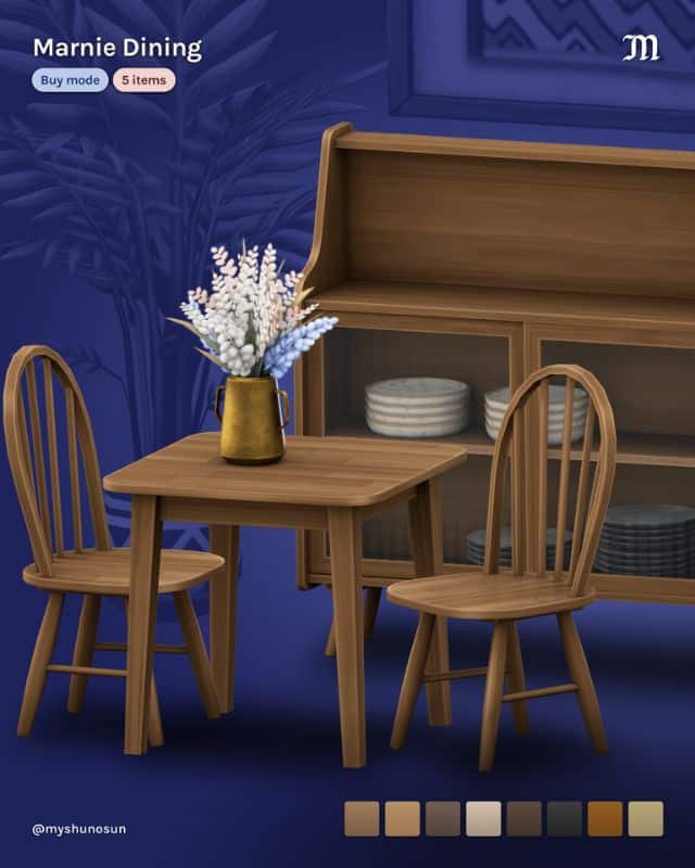 a simple wooden dining table, chairs and cupboard