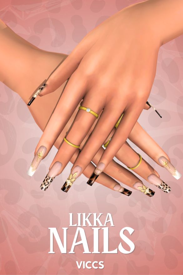 close up of long nails with leopard, gold, and charm details