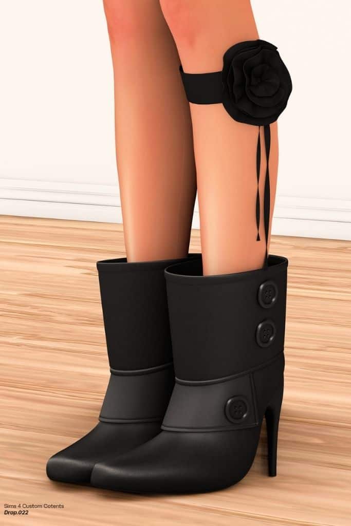 black button cuff boots with stiletto heels