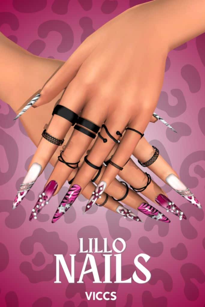 close up of stiletto Y2K-inspired nails with white, pink and black animal print and rhinestones